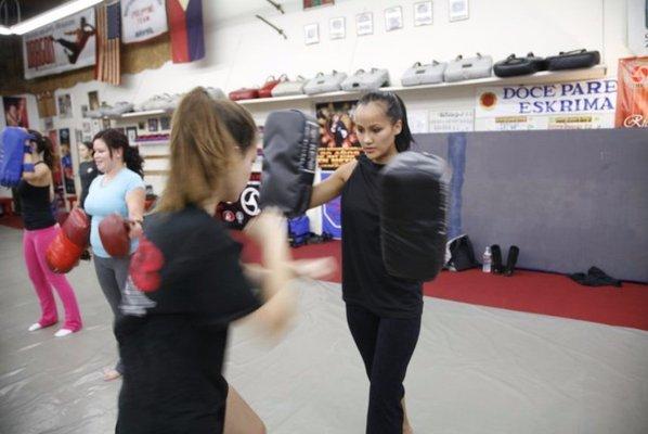 The girls doing muay thai