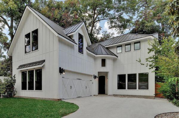 Carriage House Design with Beautiful Flushed Panel Door with Vinyl Overlay