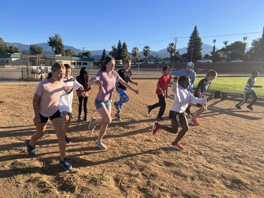 2023-2024 Run Club Team Does Warm-Ups