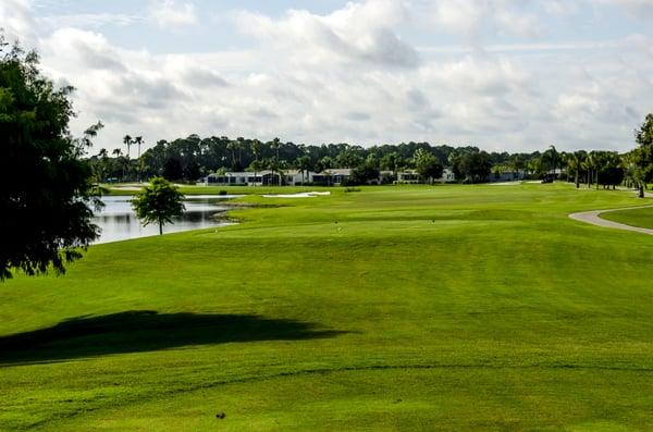 Fabulous finishing par 5, No. 18.  Water guards the entire left side as well as providing a forced carry for those wanting to go at it in 2.