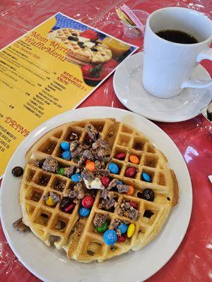 All You Can Eat waffle with M&M & mini Reeces Butter Cups add. Yummy