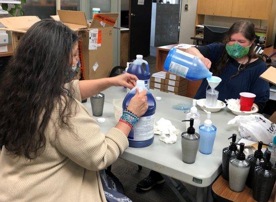 Thanks to donors, Esther & Stacie fill soap dispensers to give to local seniors