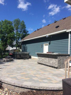 Paver patio with fire pit and grill bar