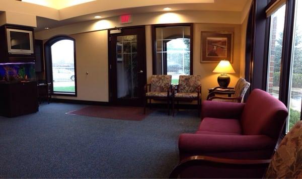 Waiting area: lovely bright area with lots of windows. Fish tank. Lots of magazines. And even a little kiddie reading desk!