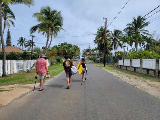 Walking along Wailea Rd to the access path