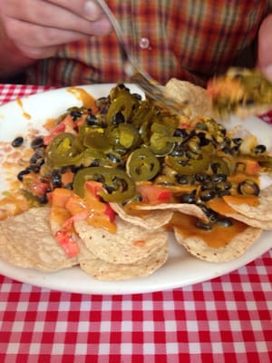 Veggie nachos. Hubby is loving jalapeños!