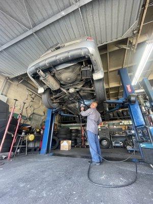 Welding the broken exhaust pipes back together. Nazo did an excellent job!