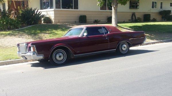 1970 Lincoln Mark III  rare color combo red inside outside. 129K miles in survivor or can do  minor restoration work and have runner