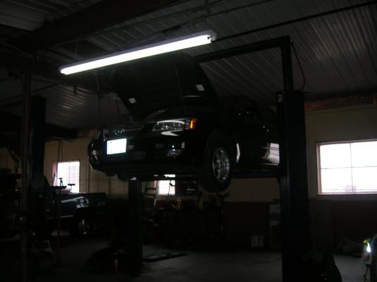 Here is another picture of our mechanic working on the car.