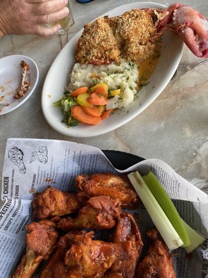 regular menu wings, triple hot sauce- blue cheese dressing and celery. Special, 1/2 lobster stuffed with crab,l.