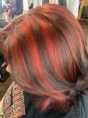 Red highlight roots melted into existing black-box dye ends