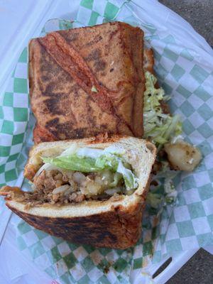 Pambaza alambre. Grilled sandwich. This one has asada, bacon, green peppers, onions & chunks of potato. It was huge & filling. $9.50!