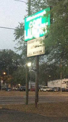 Sign outside, Says Tuesday special 50 cents off all washers