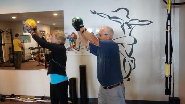 Kim training the Mancini's. Barbara has been training with the Fitness Connection for 14+ years and her husband joined us 10 ...