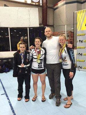 Some of the Hellfish women victorious at a local jiu jitsu tournament