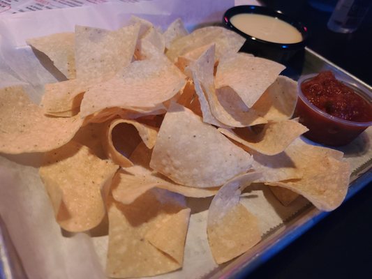 Chips, salsa, and queso. The chips were kind of stale and queso was had weird texture and taste. The salsa was very good.