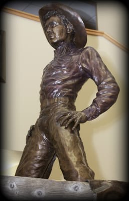 Large bronze statue of Casey Tibbs. One of three large statues on site.