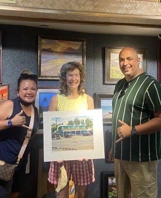 Artist Lynn Boyer with the Kalapawai Market print we bought