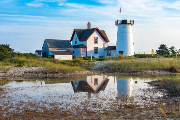 A reflection at high tide at Stage Harbor Lighthouse in Chatham, MA.