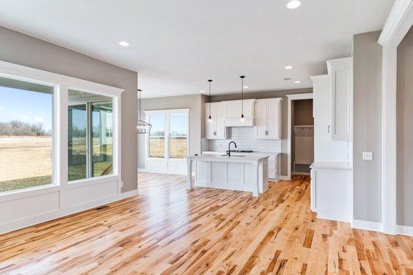 Inglenook plan with natural finished maple hardwood flooring