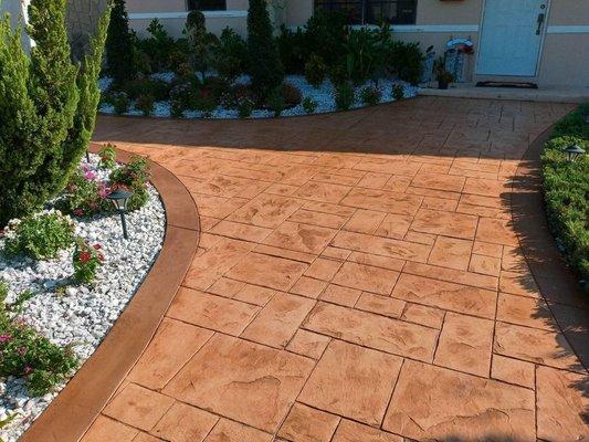 Red brick style stamped concrete driveway/entrance