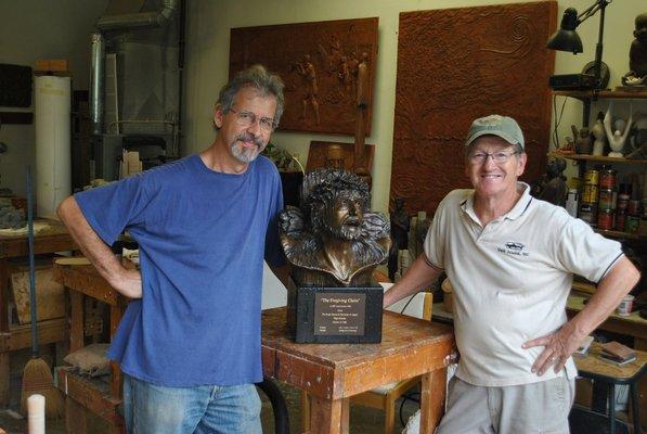 John Leon (left) with student who made this head of Christ cast in bronze. Now in the collection of Roger Bacon High School in Cincinnati