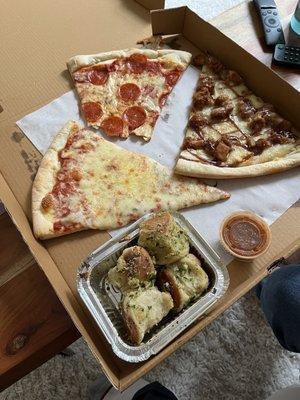 Pepperoni, cheese, and barbecue chicken pizza with garlic knots