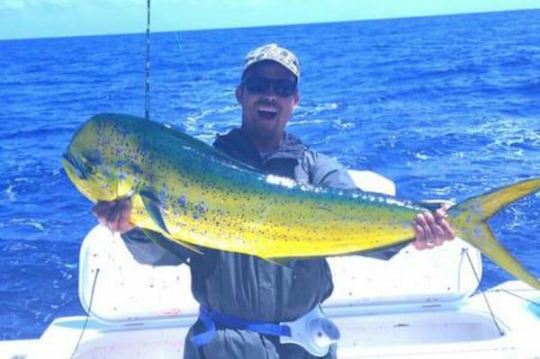 The look on his face says it all. 40# Mahi caught on a 8hr trip. Along with 35 others on this day!