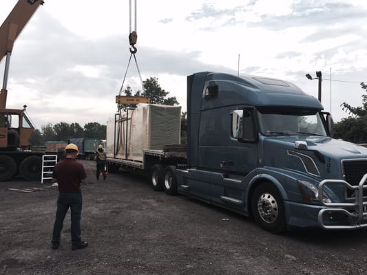 Transloading a custom paint booth