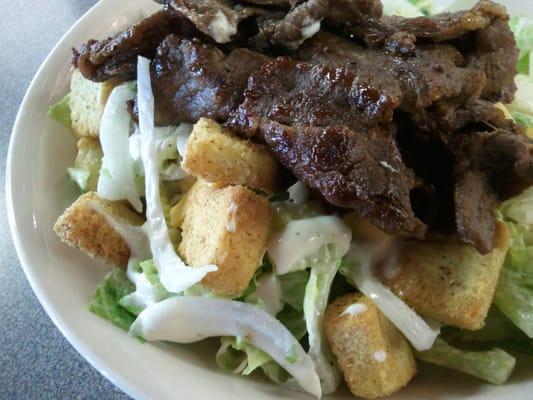 Korean Bulgogi with White Rice. Thinly Sliced  Marinated Ribeye Steak Korean Style