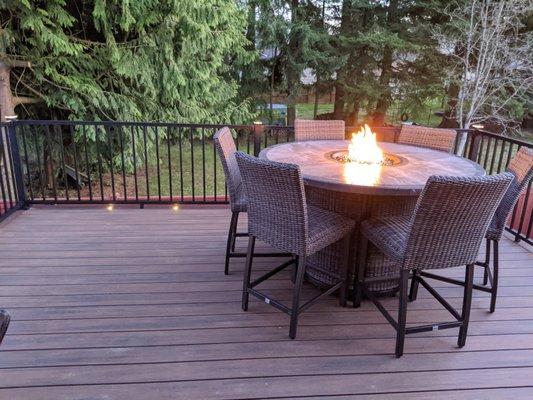 Completed: Trex Spiced Rum decking, Vintage Lantern for the border & fascia color. Black railing w/ accent lights. We love our deck!