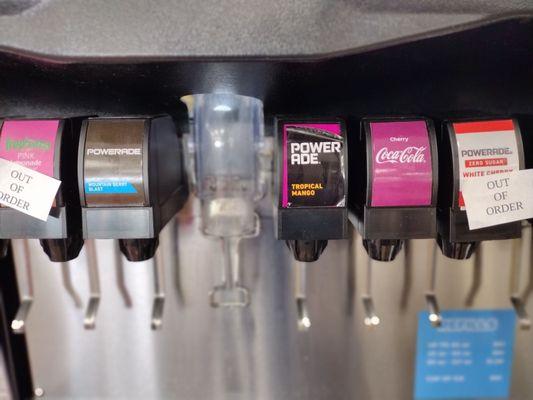 A selection of interesting Powerade flavors. This shows "tropical mango" and "white cherry" and normal "mountain berry blast".