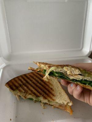 Chicken and greens panini $2.50 without chips $3 with chips! Has spinach, grilled chicken, provolone cheese, tomato pesto, and guacamole.