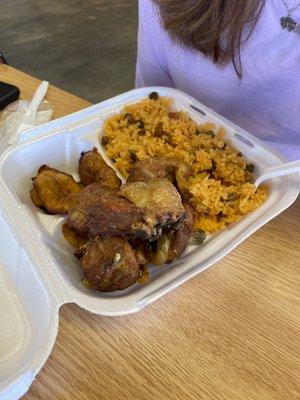 Chicharoon de pollo - Crispy Roasted chicken -with pigeon pea rice and sweet plantains.  Chicken was crispy and delicious!