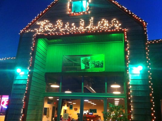 Front of the restaurant at night.