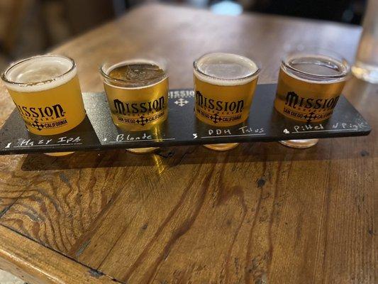 4 beer flight. $2 each taster 7% abv or lower, $3 for each over 7% abv.