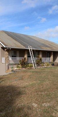 Roof cleaning in process