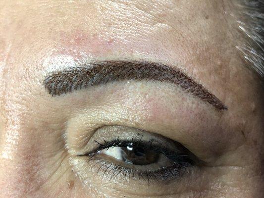 Micro blade eye brows immediately after procedure.