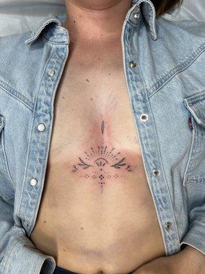 Fine Line Sternum Tattoo