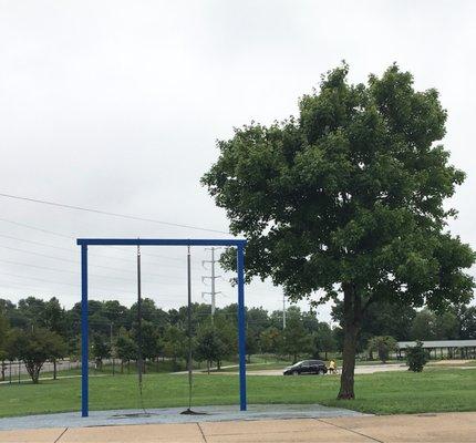 A trail includes fitness equipment, like this climbing apparatus.