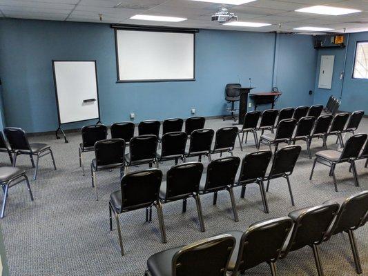 Fully equipped meeting room with projector, drinking water, internet, whiteboard and more!