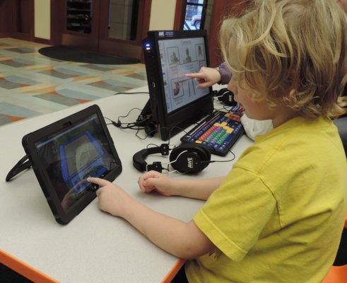 An AWE tablet and computer station specifically for children can be found near the story time room.