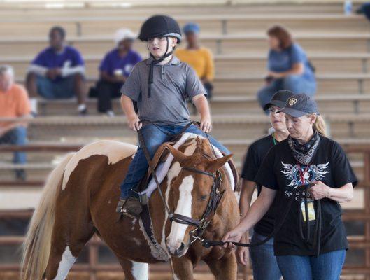 Milton GA - Horse assisted therapy helps kids with disabilities improve motor coordination and balance