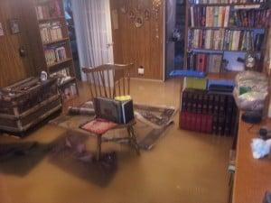 Flood Waters come pouring into the Living room Boise Idaho, The Flood Damage was intense, However the Flood Repair went well for