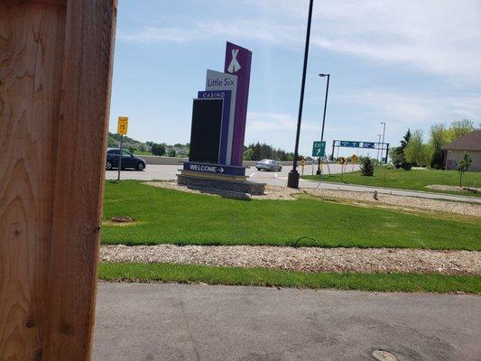 Look for the Casino Sign just before the overpass and to your left if coming by way of 42.