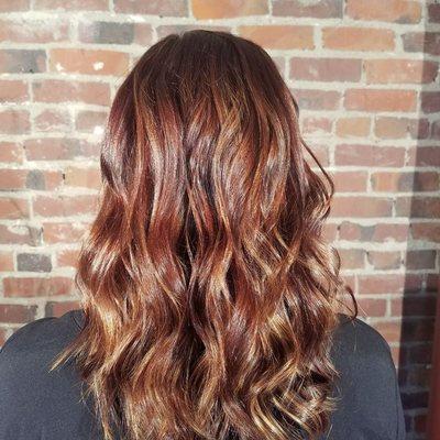 Hand painted highlights aka Balayage! It's as if the sun painted her hair!