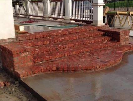 Red brick porch entrance steps