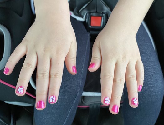 My daughter's manicure. She is 3 1/2. Emily, her manicurist was lovely and very talented.