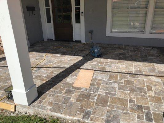 Natural stone in a French pattern. We have tile for your porch.