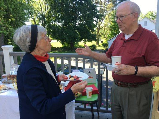 Ray and Corrine talk after our 8am service.